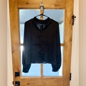 Small long sleeve black blouse